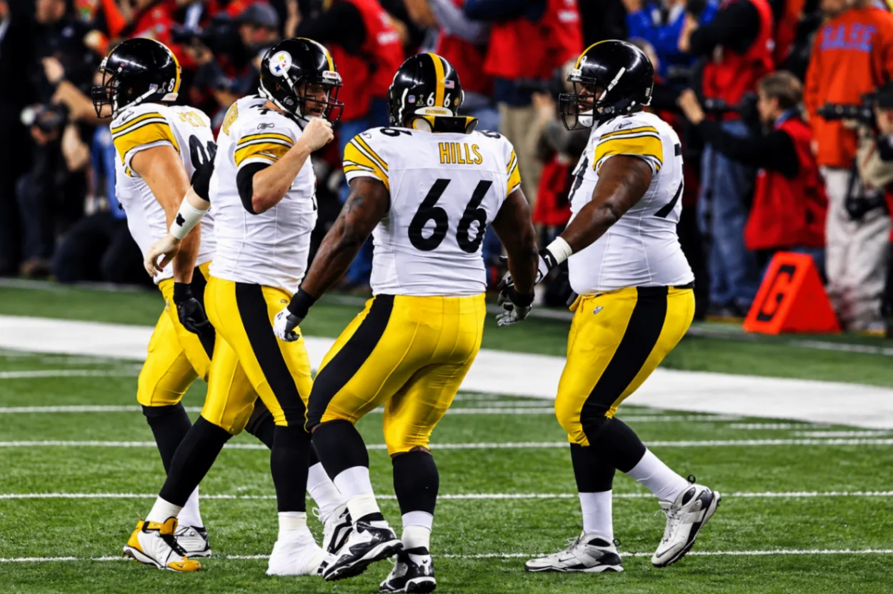 Tony Hills with Steelers teammates on the field